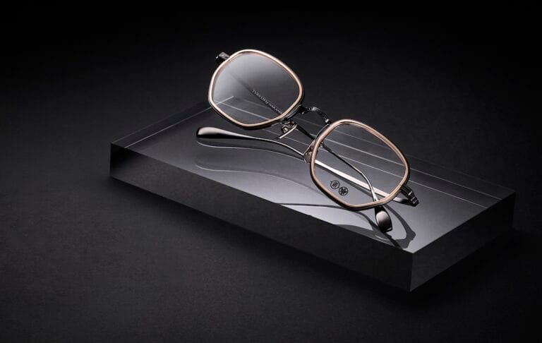 539_Black+LightGold copy | Eyestylist Luxury Eyeglasses with Rose-gold Frames Resting on a Crystal Pedestal Against a Dark Background, Showcasing the Product's Design. | Eyestylist 8th June 2026