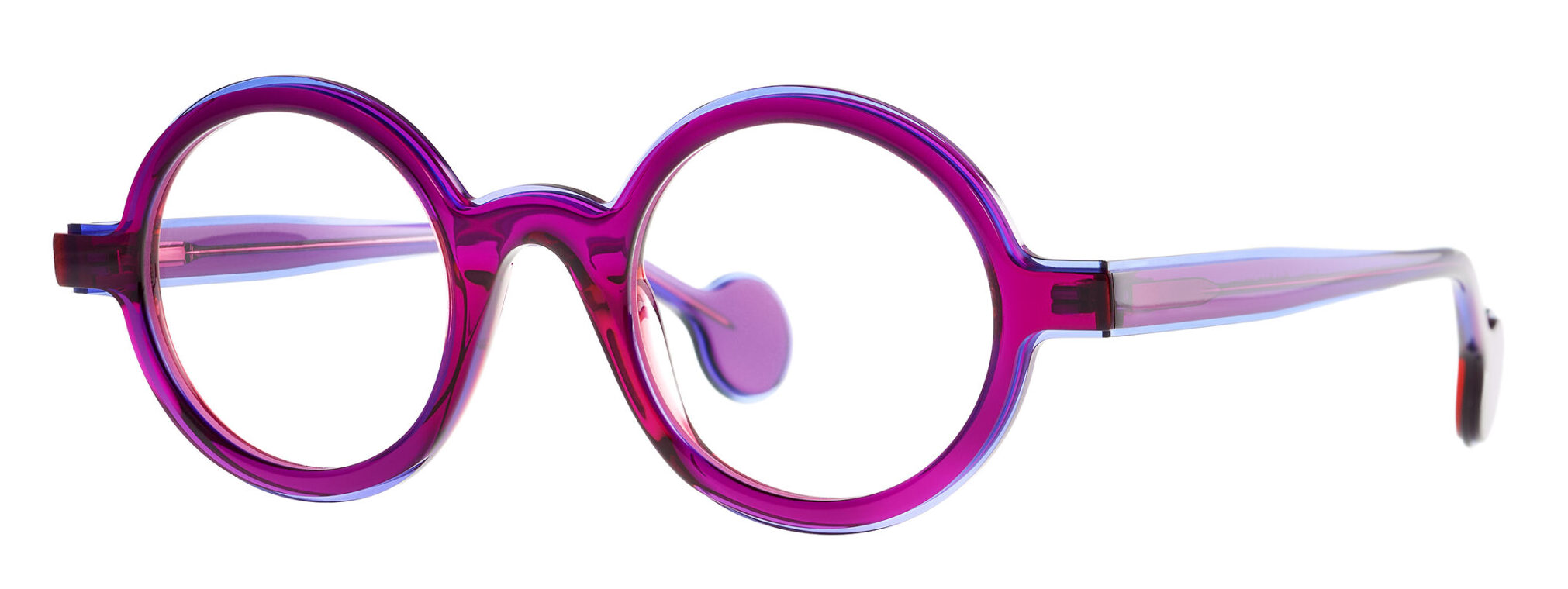 Bright pink round-framed eyeglasses with translucent plastic on white background, close-up view
